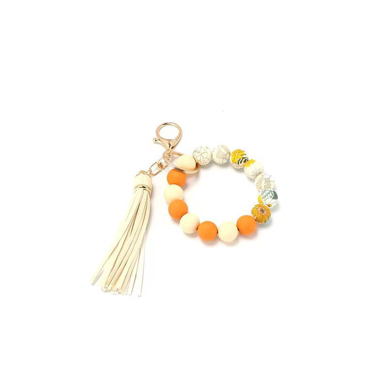 Wholesale Silicone Food Grade Cartoon Tassel Printed Silicone Wrist Keychain